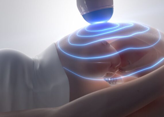 Pregnant woman undergoing obstetric ultrasound scan at a prenatal imaging clinic